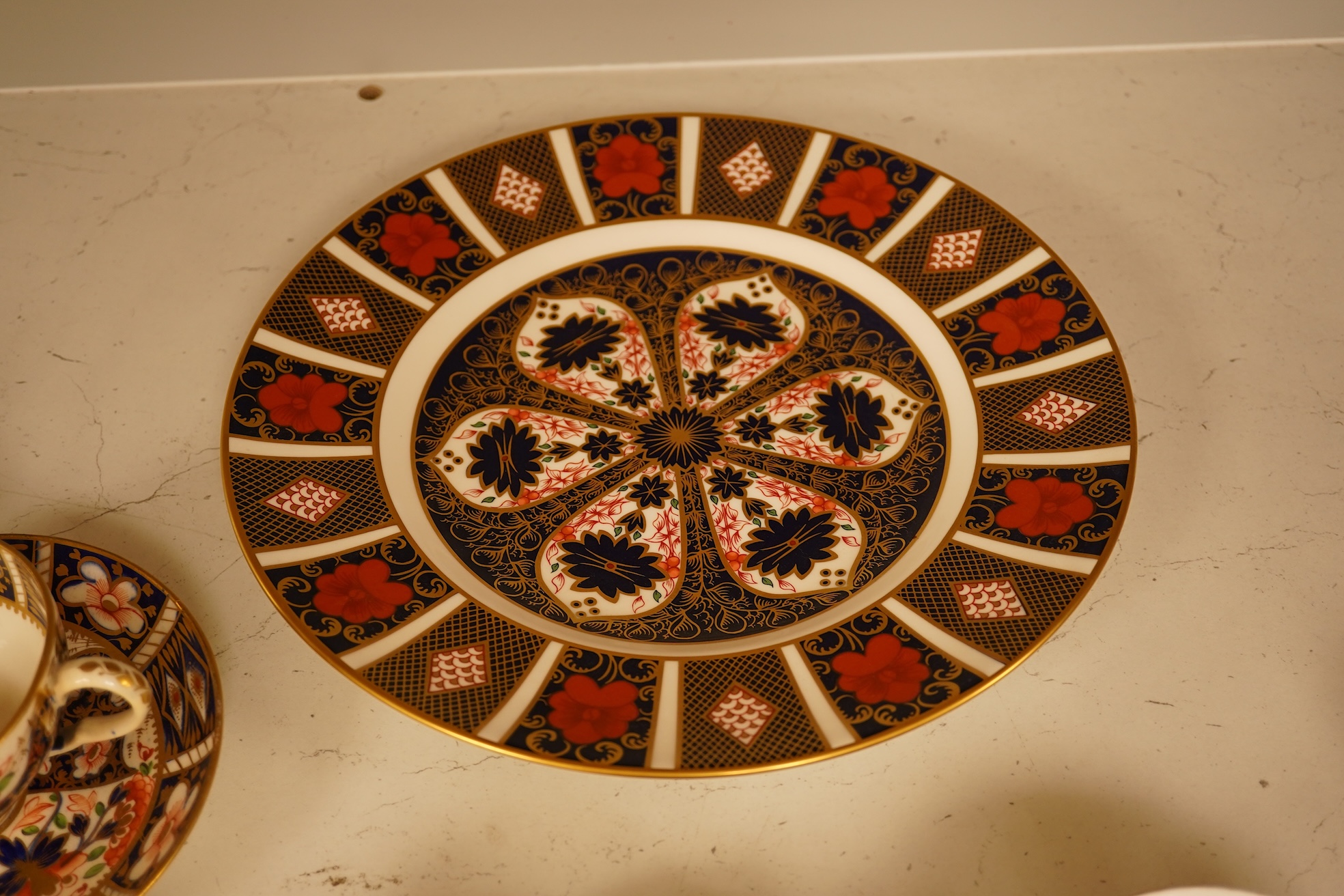 Twelve items of various patterns of Royal Crown Derby, largest item 27cm diameter